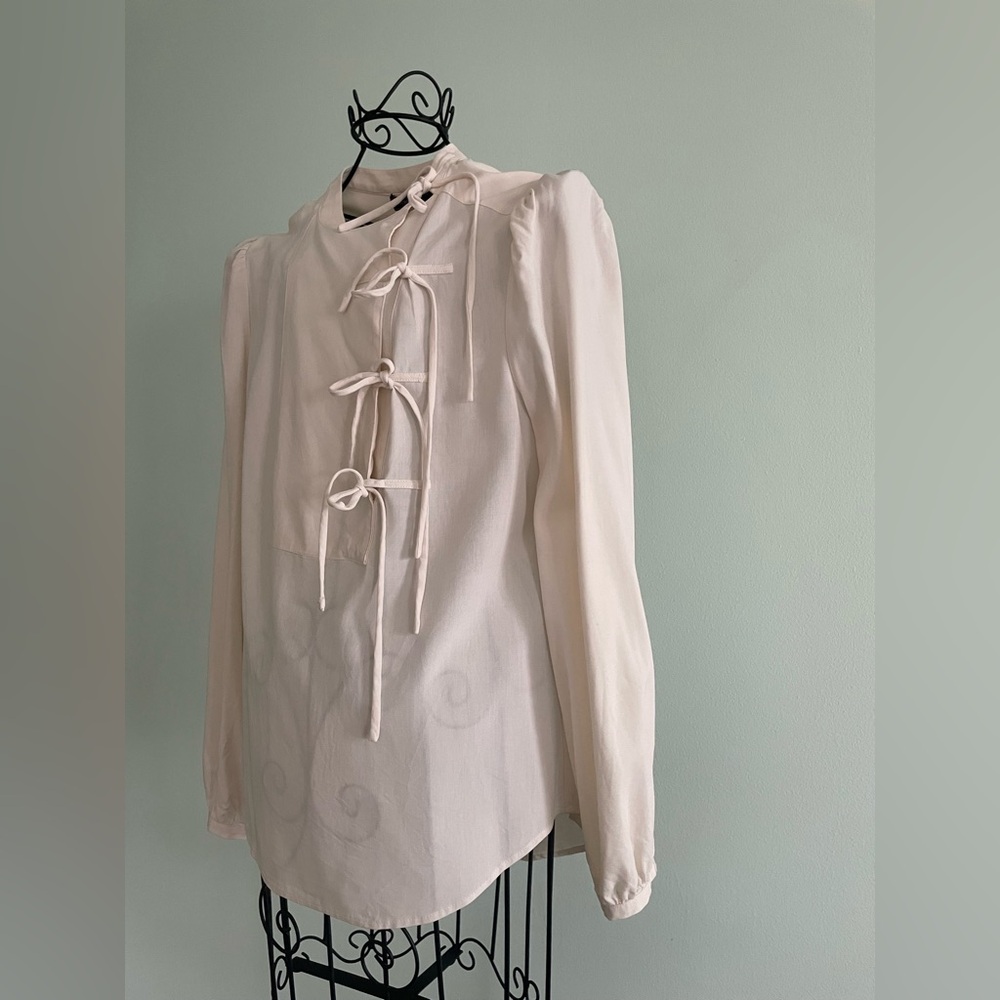 BCBG Max Azria Silk  long sleeve blouse with asymmetrical closure in off white